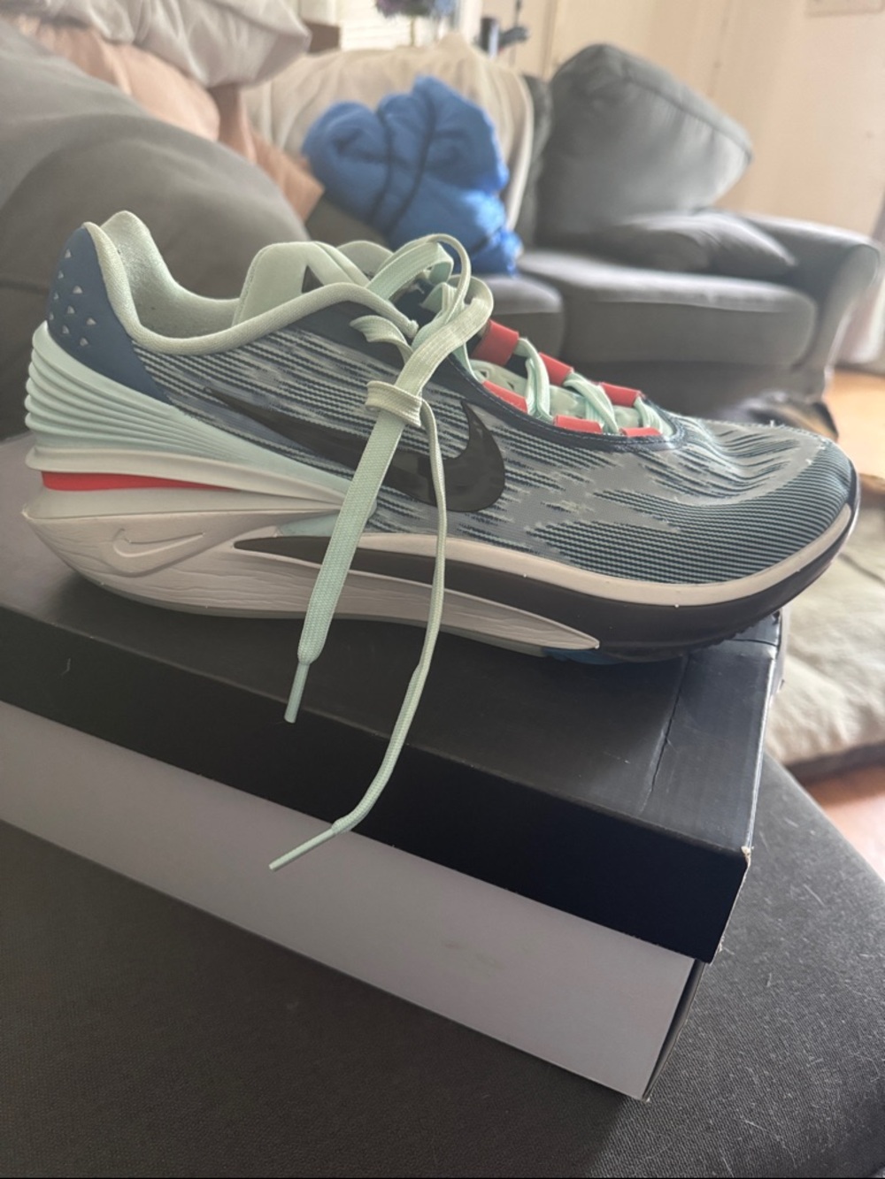 Nike Light Blue Running Shoe with Mint Laces and Black Swoosh